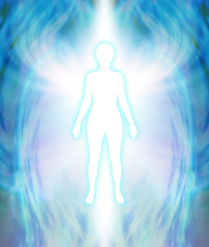 Silhouette of a person surrounded by a bright aura, with blue and white light swirling around, against a blurred background.