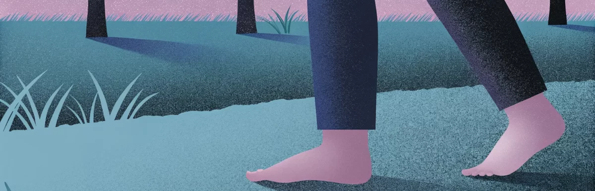 Illustration of bare feet walking on a path in a grassy field at dusk, with silhouetted trees and a gradient sky from pink to purple.