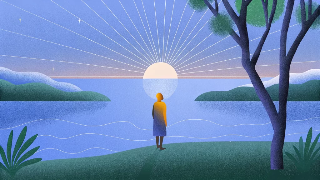Person in yellow coat stands by a lake at sunrise, surrounded by trees and hills, with lines radiating from the sun.